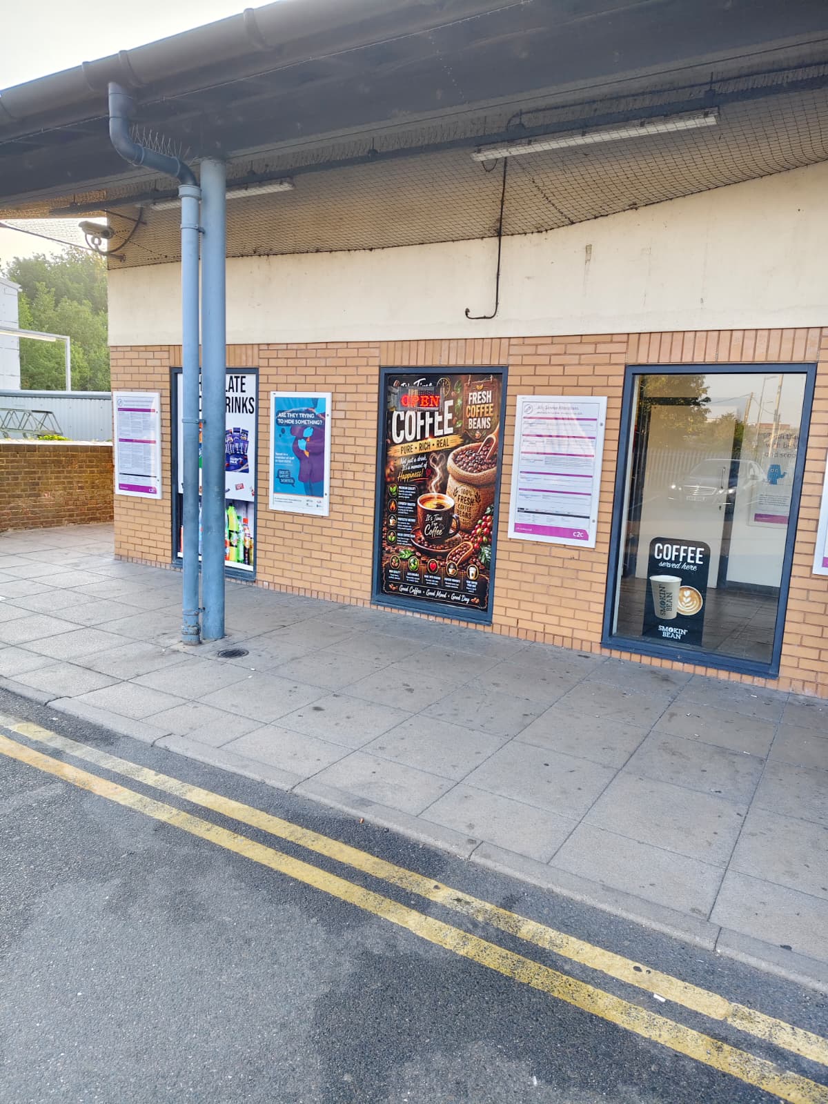 Store front with coffee posters